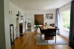 Spacious dining space with mid century vibe